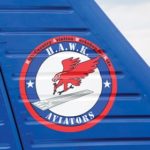 Tail Logo HAWK Youths Arrive in Aircraft They Restored Colorado group aims to interest young adults in aviation From https://www.eaa.org/en/airventure/eaa-airventure-news-and-multimedia/eaa-airventure-news/eaa-airventure-oshkosh/07-27-2017-hawk-youths-arrive-in-aircraft-they-restored by James Wynbrandt Courtesy & Copyright Andrew Zaback, Photographer