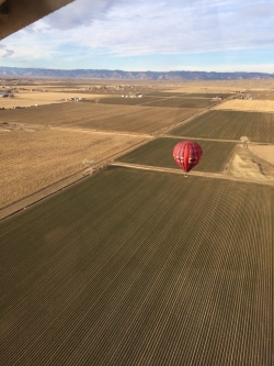 Picture of the HAWK balloon in flight with kids at the burner. Picture taken by Randy Owens out of his Zenith 701 Courtesy Randy Owens, Photographer
