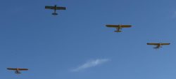 A fly over in honor of Eddie Clements.Eddie Clements was a pilot and the founder of a High Country Aviation Workshop for Kids. Aviation-full service at Mack airport. Courtesy and Copyright Grand Junction Sentinel, Christopher Tomlinson, Photographer