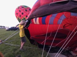 Holding the Throat, Balloon glow event at OSH Airventure 2021 Hawk display Courtesy & © Bruce Erickson, Photographer